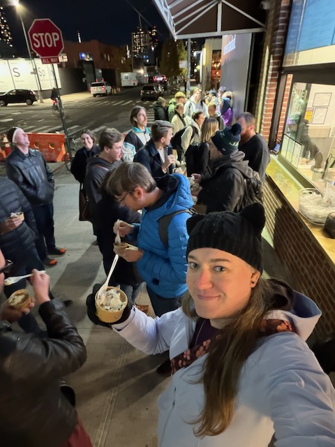 Astral folks bundled up in the cold eating ice cream
